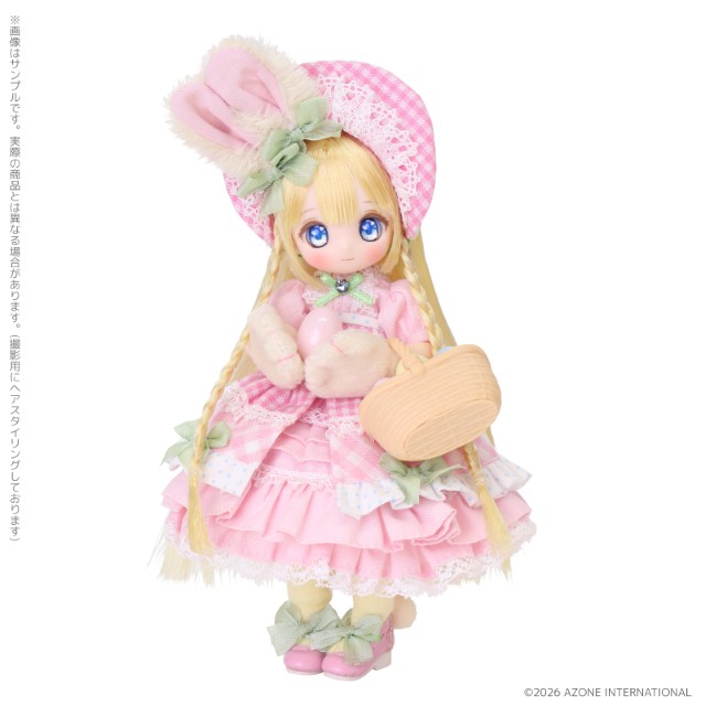 Biscuitina 20th anniversary edition front view highlighting her pink ruffled dress and Easter accessories