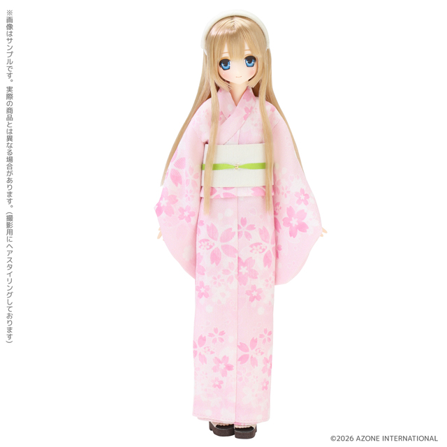 Sahra in her sakura-print yukata with gold hair